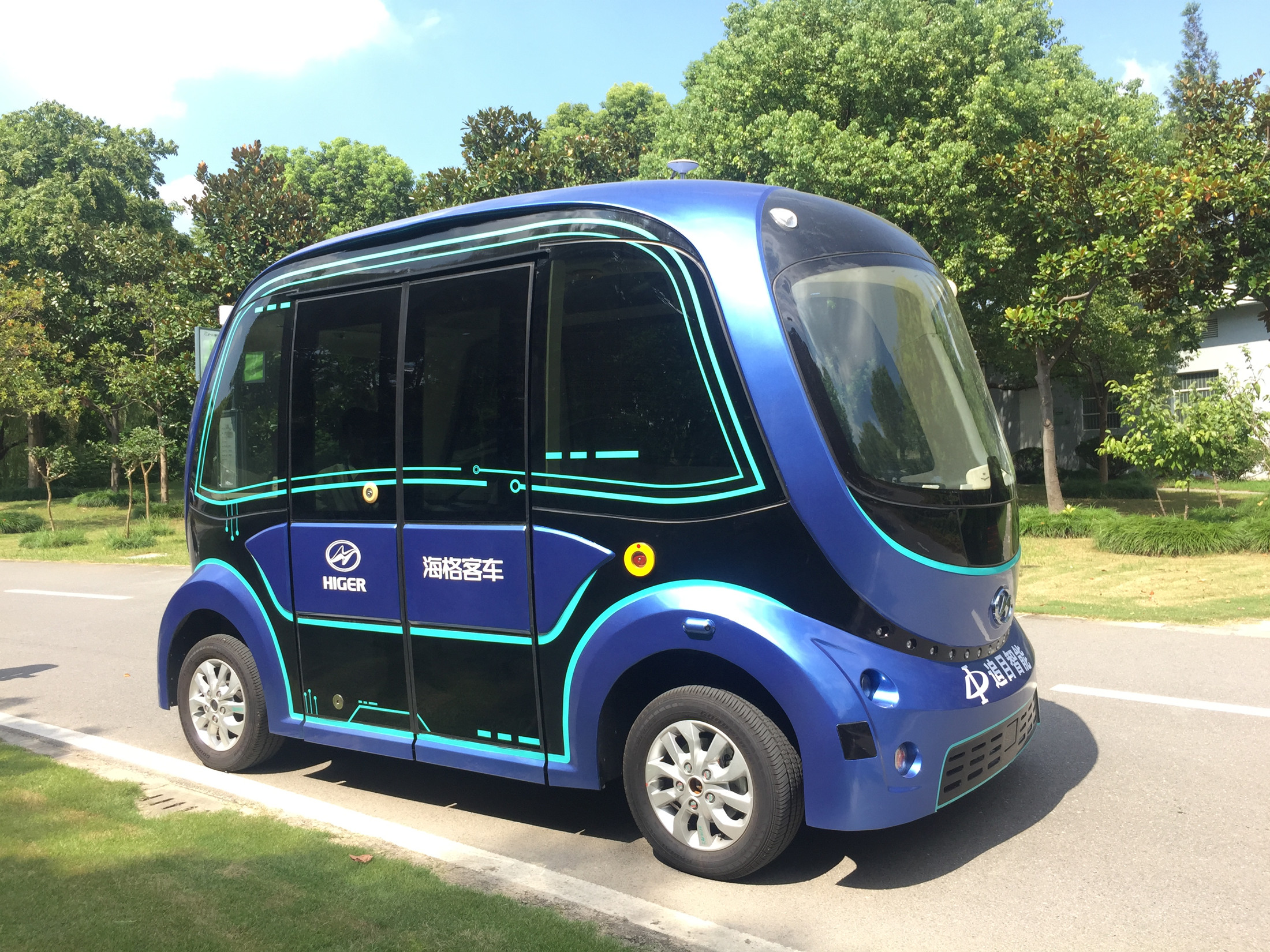 1573836011401584.jpg 行駛在汽車博覽公園的蘇州金龍無人駕駛巴士深藍_副本.jpg